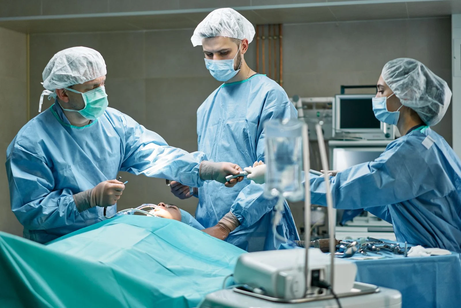 Medical professionals working together in an operating room